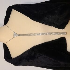 Elegant Silver and Rhinestone Necklace with a Cascading Tassel